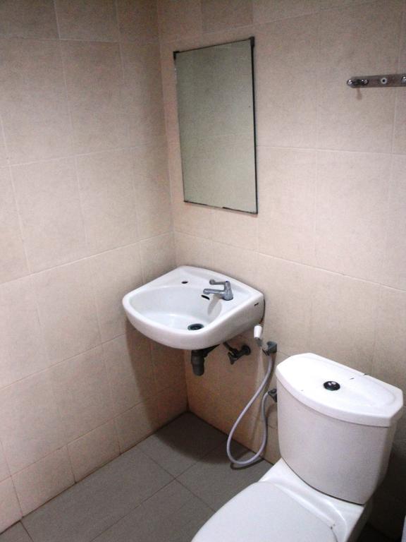 Metropolitan Inn Manado Quarto foto
